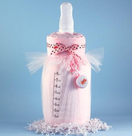 http://www.storkbabygiftbaskets.com/cdn/shop/products/baby-bottle-blanket-pink.jpg?v=1615079259